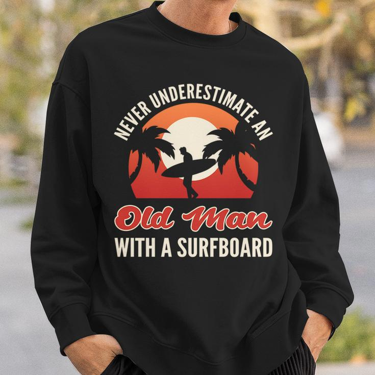 Never Underestimate An Old Man With A Surfboard Surfer Sweatshirt Gifts for Him