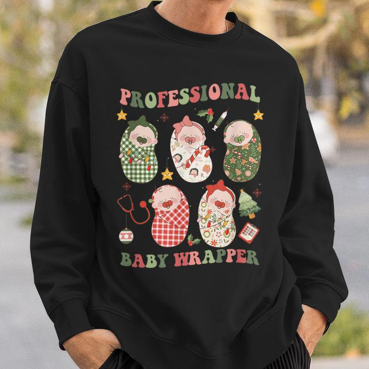 Professional Baby Wrapper Labor And Delivery Christmas Nurse Sweatshirt Gifts for Him