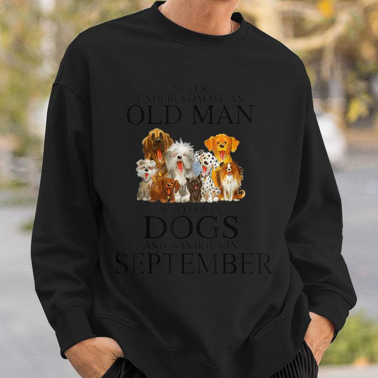 Never Underestimate An Old Man Who Loves Dogs In September Sweatshirt Gifts for Him