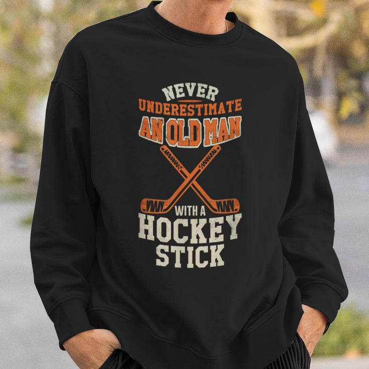 Never Underestimate An Old Man With A Stick Old Man Hockey Sweatshirt Gifts for Him