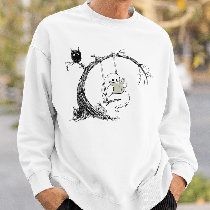 Cute Ghost Swinging Reading Book Halloween Ghost Costume Sweatshirt Gifts for Him