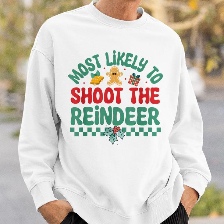 Most Likely To Shoot The Reindeer Christmas Pajamas Sweatshirt Gifts for Him