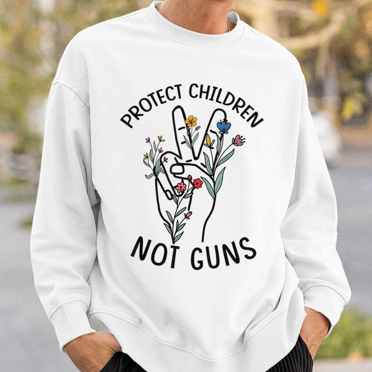 Protect Children Not Guns End Gun Violence Anti Gun Orange Sweatshirt Gifts for Him