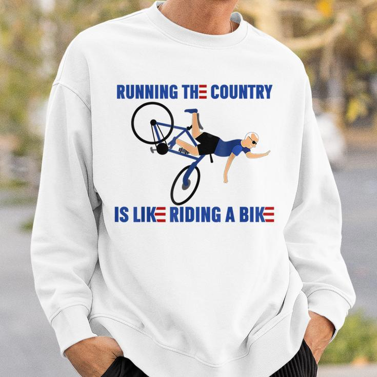 Running The Country Is Like Riding A Bike Joe Biden Funny Running Funny Gifts Sweatshirt Gifts for Him