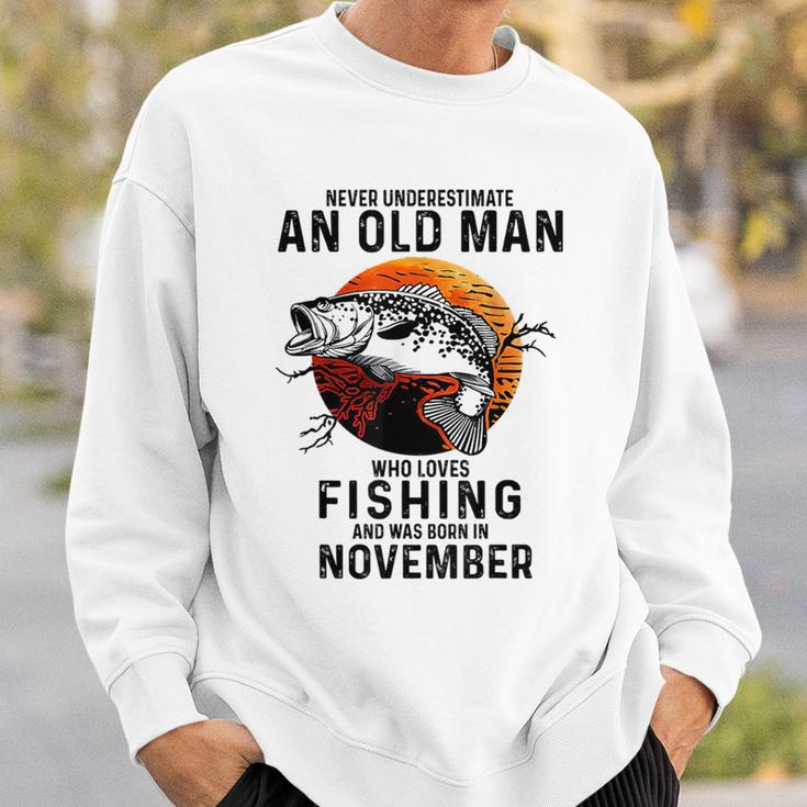 Never Underestimate An Old Man Fishing Was Born In November Sweatshirt Gifts for Him