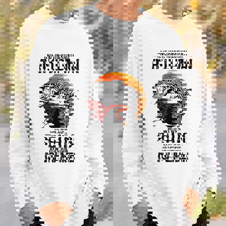 Never Underestimate An Old Man Fishing Was Born In November Sweatshirt Gifts for Him