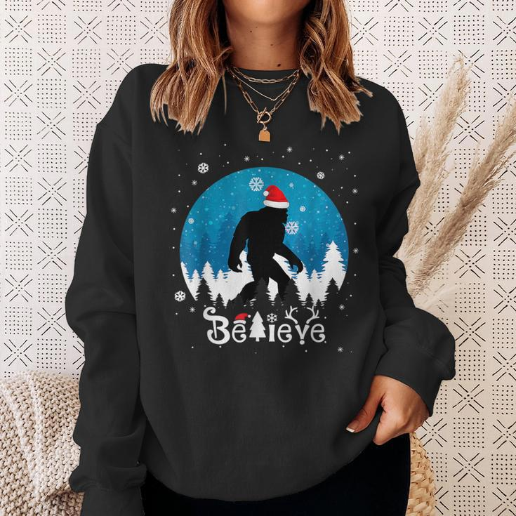 Christmas Xmas Bigfoot Believe Sasquatch In Moon Light Sweatshirt Gifts for Her