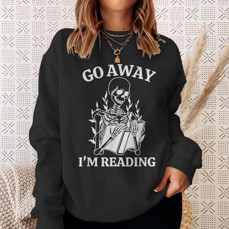 Go Away Im Reading Skeleton Book Sweatshirt Gifts for Her