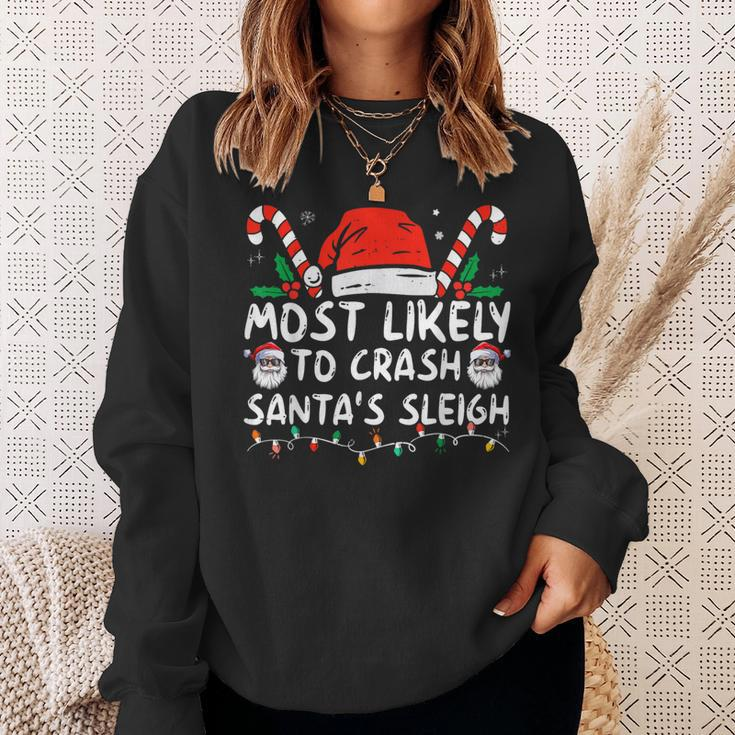 Most Likely To Crash Santa's Sleigh Christmas Joke Sweatshirt Gifts for Her