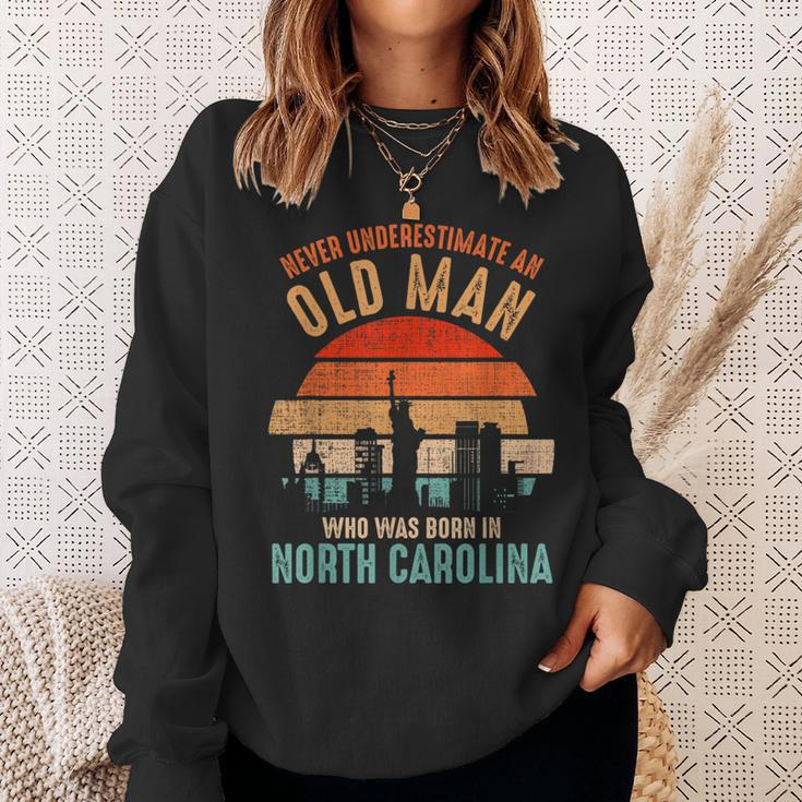 Mb Never Underestimate An Old Man In North Carolina Sweatshirt Gifts for Her