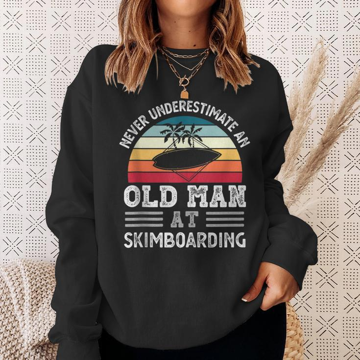 Never Underestimate An Old Man At Skimboarding Fathers Day Gift For Mens Sweatshirt Gifts for Her