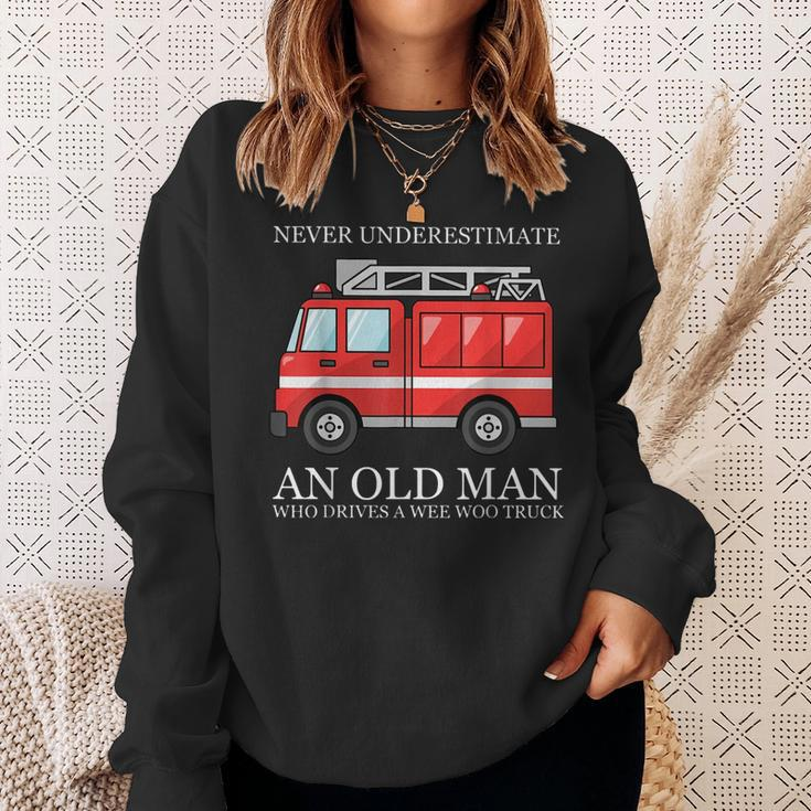 Never Underestimate An Old Man Who Drivers A Wee Woo Truck Sweatshirt Gifts for Her