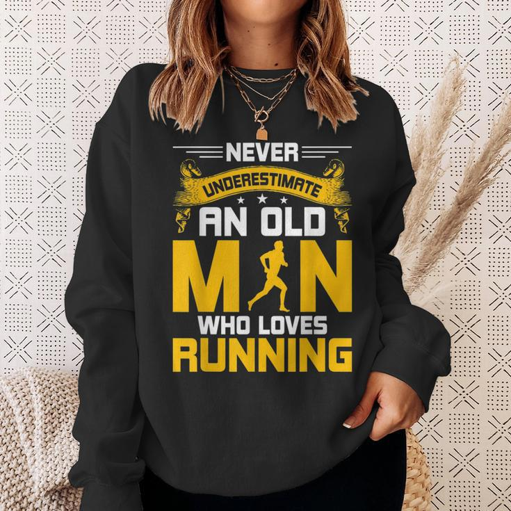 Never Underestimate An Old Man Who Loves Running Gift Sweatshirt Gifts for Her