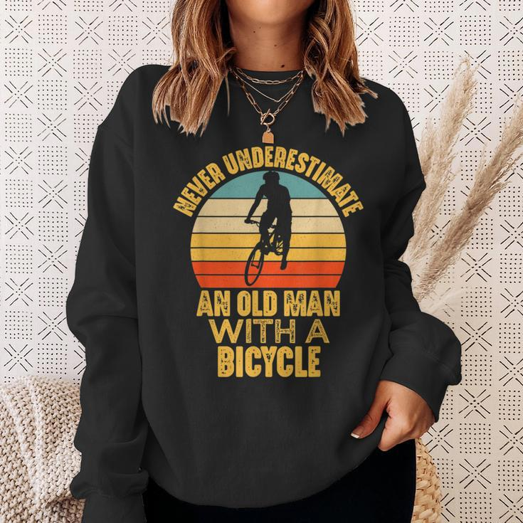 Never Underestimate An Old Man With A Bicycle Funny Cycling Sweatshirt Gifts for Her