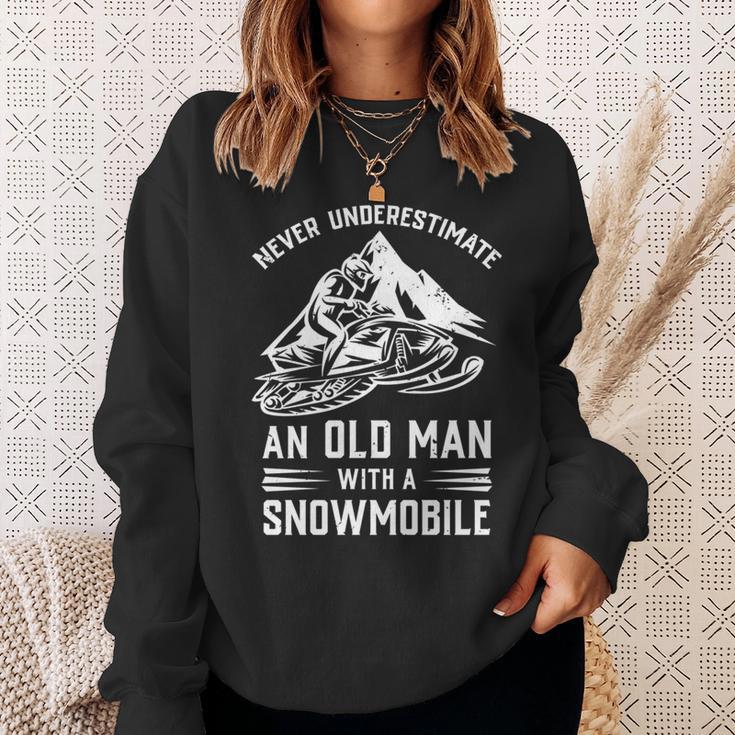 Never Underestimate An Old Man With A Snowmobile Funny Gift Sweatshirt Gifts for Her