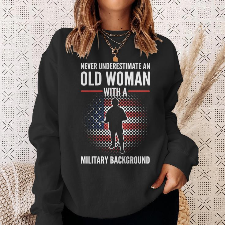 Never Underestimate An Old Woman With A Military Background Sweatshirt Gifts for Her