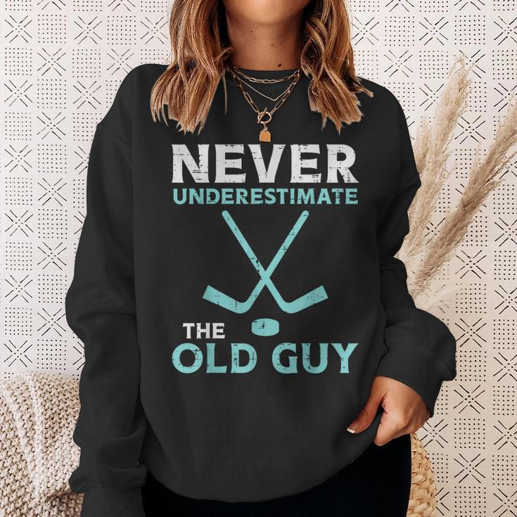 Never Underestimate The Old Guy Ice Hockey Funny Fathers Day Gift For Mens Sweatshirt Gifts for Her