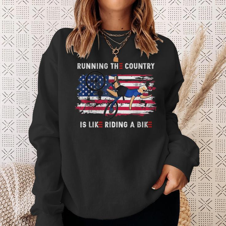 Running The Country Is Like Riding A Bike Funny Joe Biden Running Funny Gifts Sweatshirt Gifts for Her