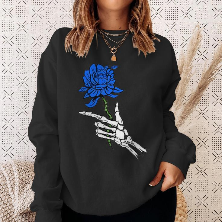 Skeleton Hand Holding A Blue Rose Sweatshirt Gifts for Her