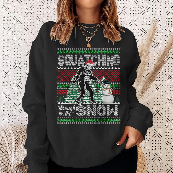 Squatching Through The Snow Bigfoot Ugly Sweater Christmas Sweatshirt Gifts for Her