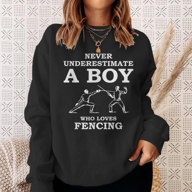 Never Underestimate A Boy Who Loves Fencing Sweatshirt Gifts for Her