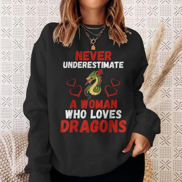 Never Underestimate Love Dragons Graphic Sweatshirt Gifts for Her