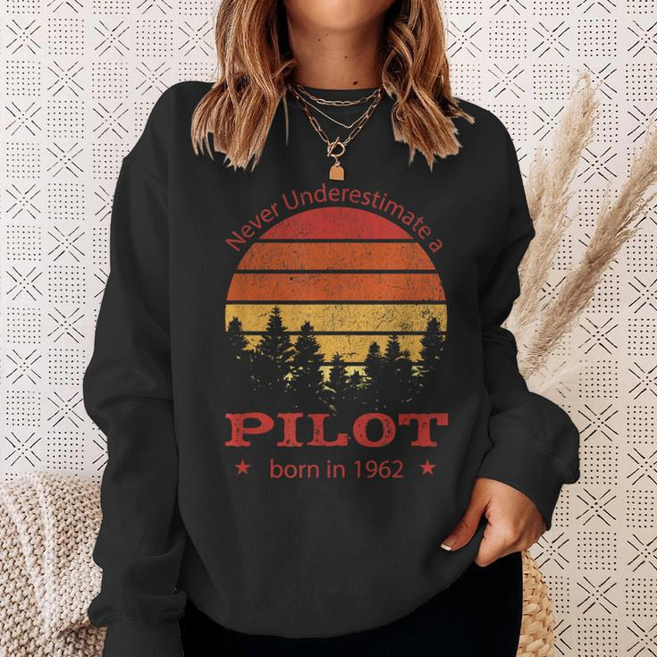 Never Underestimate A Pilot Flying Planes Retro Sunset Sweatshirt Gifts for Her