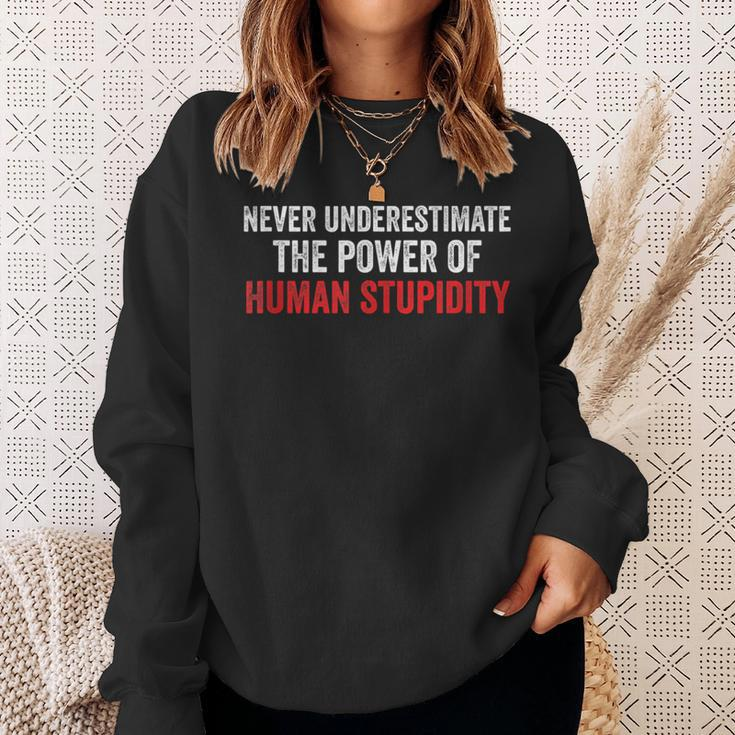 Never Underestimate The Power Of Human Stupidity Sweatshirt Gifts for Her
