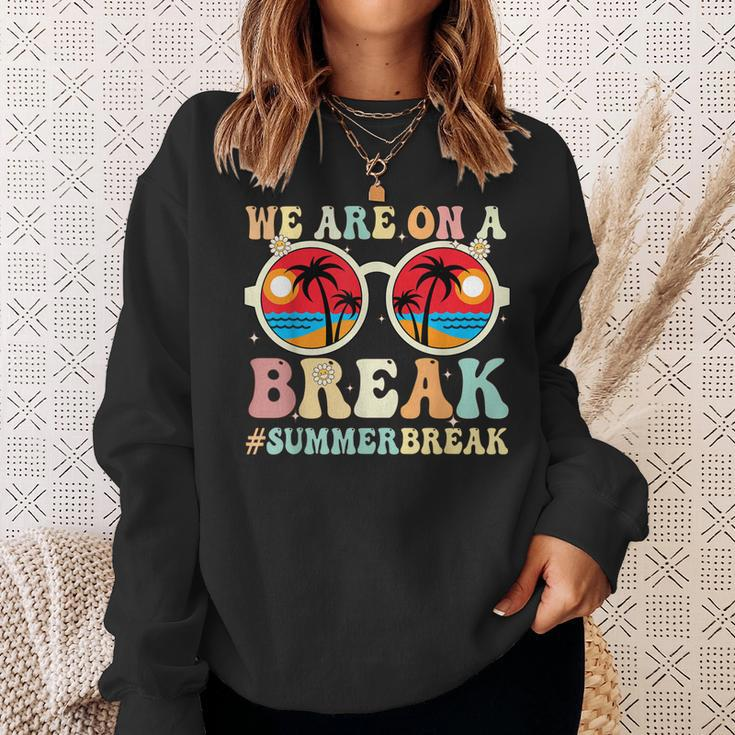 We Are On A Break Teacher Retro Groovy Summer Break Teachers Sweatshirt Gifts for Her