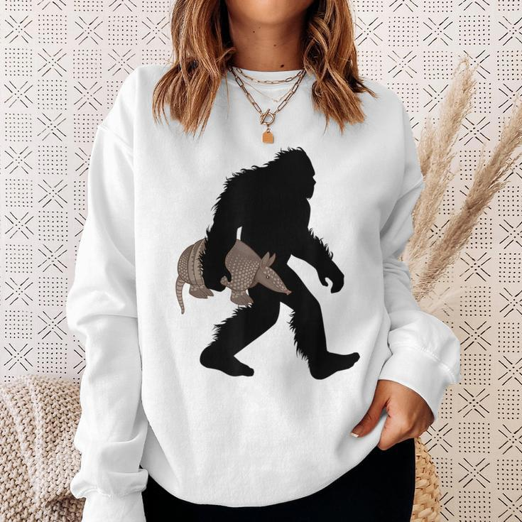 Bigfoot Cradling Armadillo Cryptid Sasquatch Sweatshirt Gifts for Her