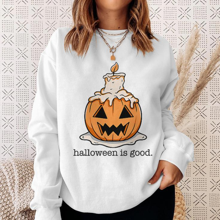Halloween Is Good And Life Spooky Pumpkin Candle Halloween Sweatshirt Gifts for Her