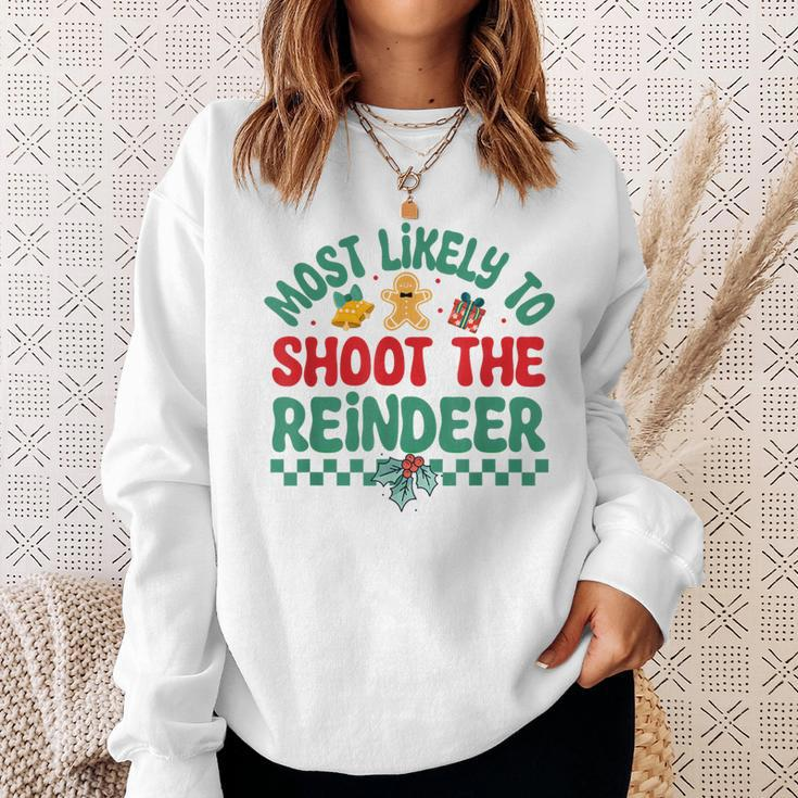 Most Likely To Shoot The Reindeer Christmas Pajamas Sweatshirt Gifts for Her