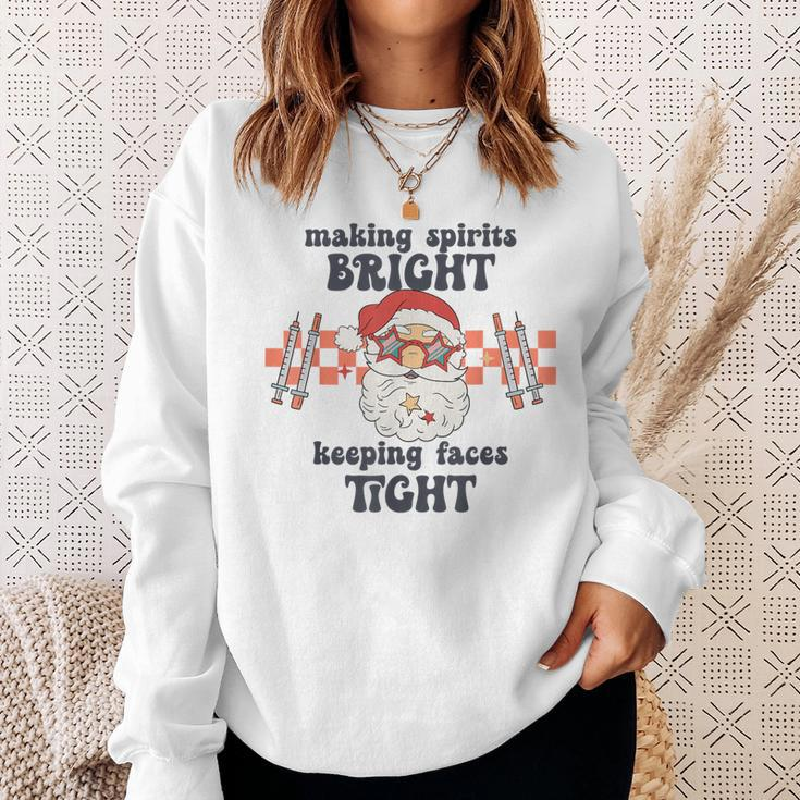 Making Spirits Bright Keeping Faces Tight Santa Christmas Sweatshirt Gifts for Her