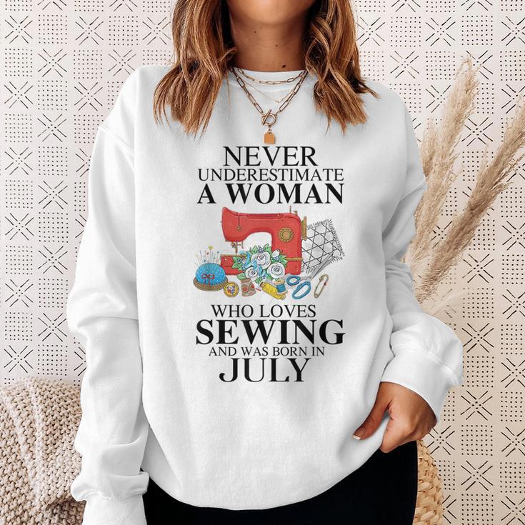 Never Underestimate A Woman Who Loves Sewing Was Born In Sweatshirt Gifts for Her