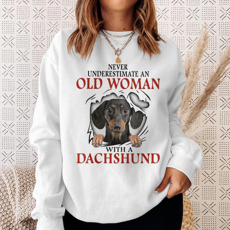 Never Underestimate An Old Woman With A Dachshund Sweatshirt Gifts for Her