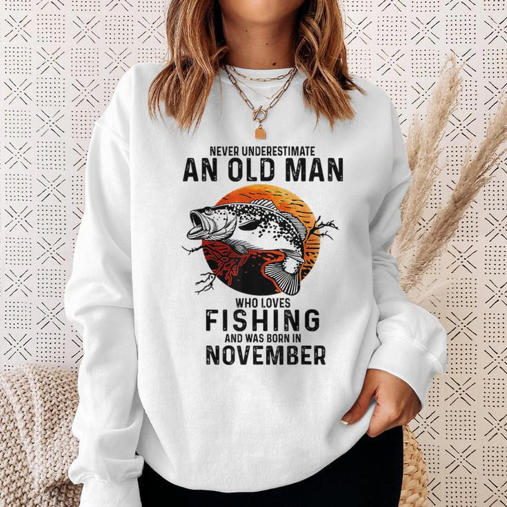 Never Underestimate An Old Man Fishing Was Born In November Sweatshirt Gifts for Her