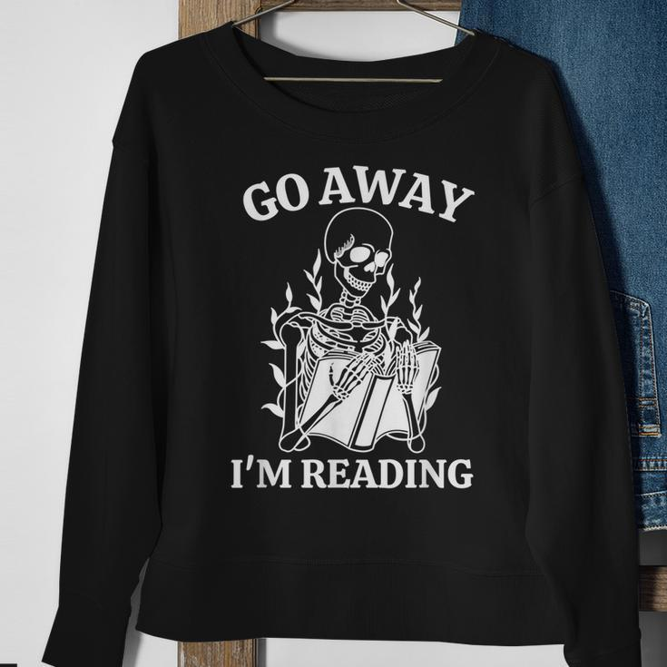 Go Away Im Reading Skeleton Book Sweatshirt Gifts for Old Women