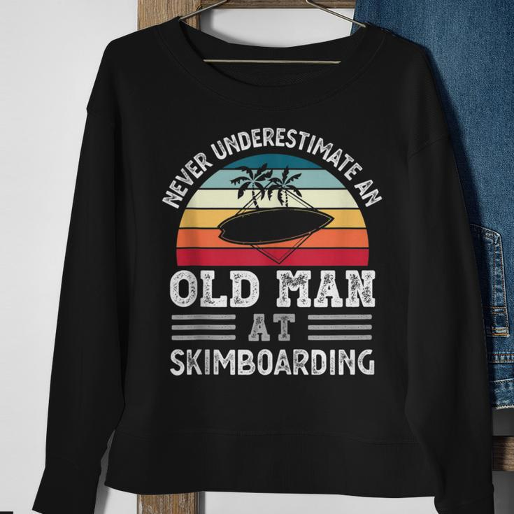 Never Underestimate An Old Man At Skimboarding Fathers Day Gift For Mens Sweatshirt Gifts for Old Women