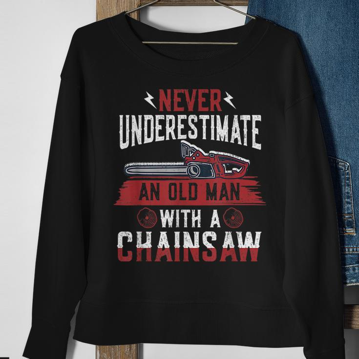 Never Underestimate An Old Man Chainsaw Lumberjack Sweatshirt Gifts for Old Women