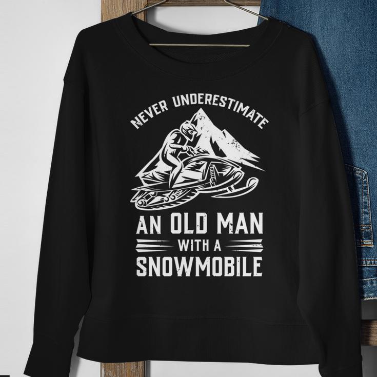 Never Underestimate An Old Man With A Snowmobile Funny Gift Sweatshirt Gifts for Old Women