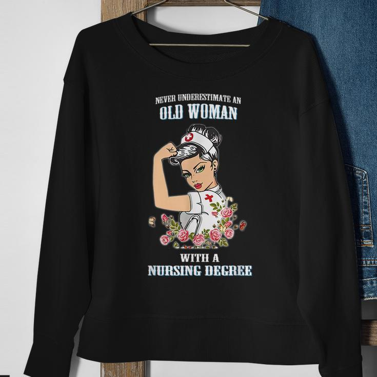 Never Underestimate An Old Woman With A Nursing Degree Old Woman Funny Gifts Sweatshirt Gifts for Old Women