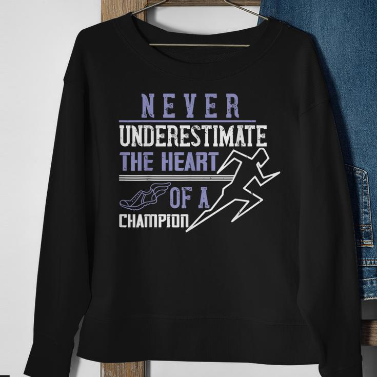Never Underestimate The Heart Of A Champion Sweatshirt Gifts for Old Women