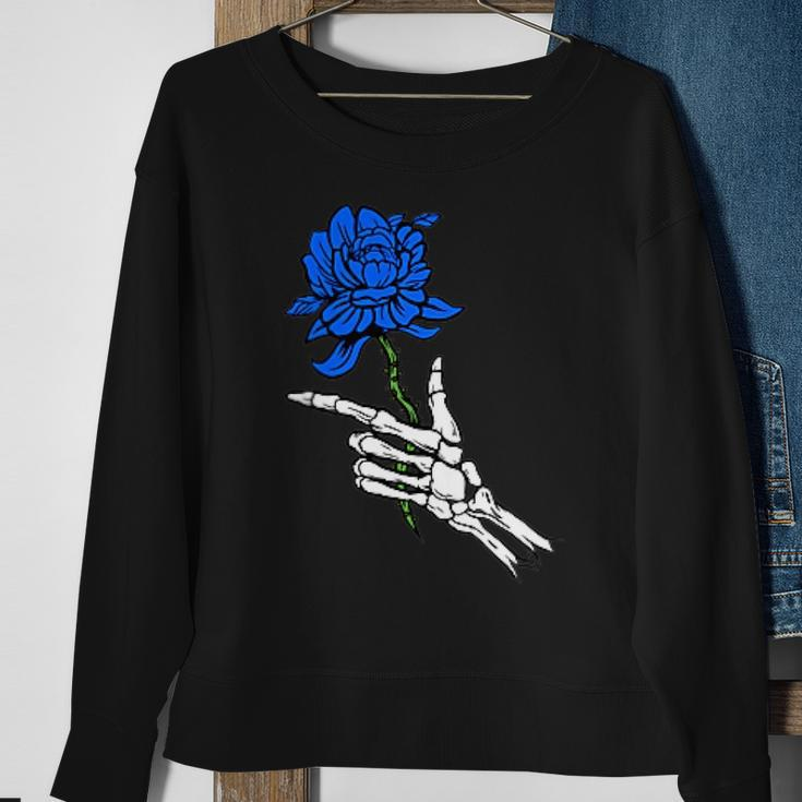 Skeleton Hand Holding A Blue Rose Sweatshirt Gifts for Old Women