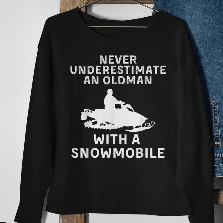 Snowmobile Never Underestimate An Old Man Winter Sports Sweatshirt Gifts for Old Women