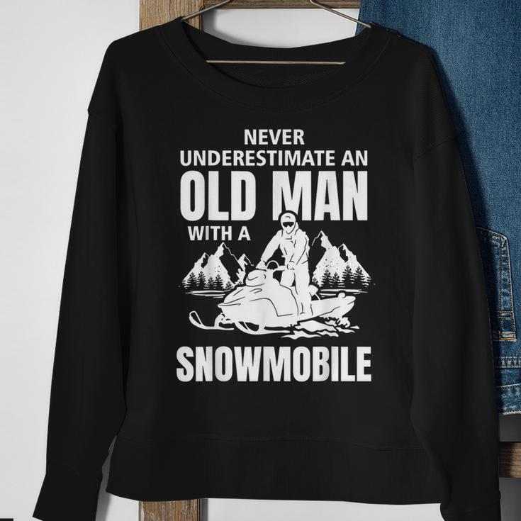 Snowmobile Never Underestimate With An Oldman Winter Sports Sweatshirt Gifts for Old Women