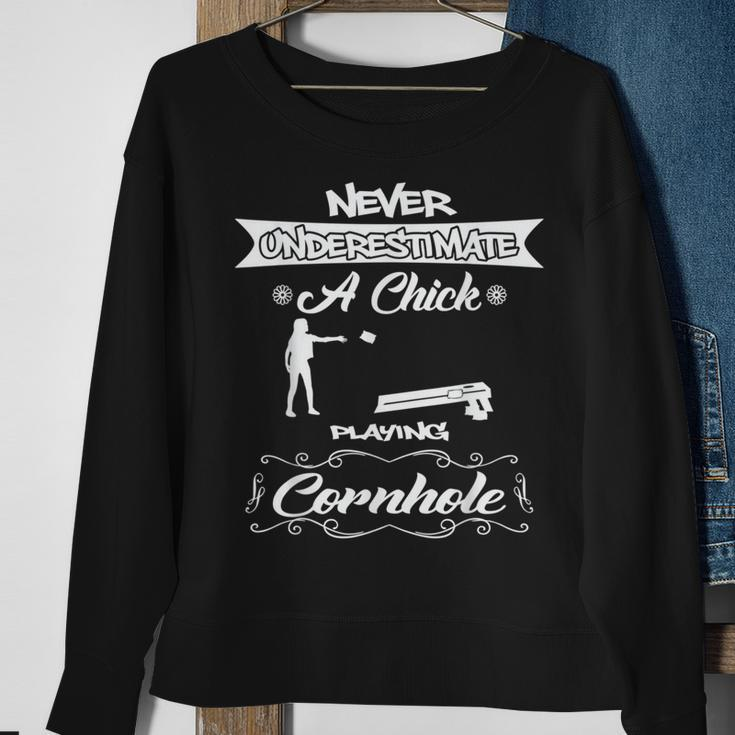 Never Underestimate A Chick Playing Cornhole Sweatshirt Gifts for Old Women