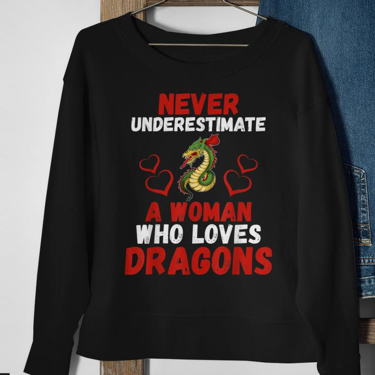 Never Underestimate Love Dragons Graphic Sweatshirt Gifts for Old Women