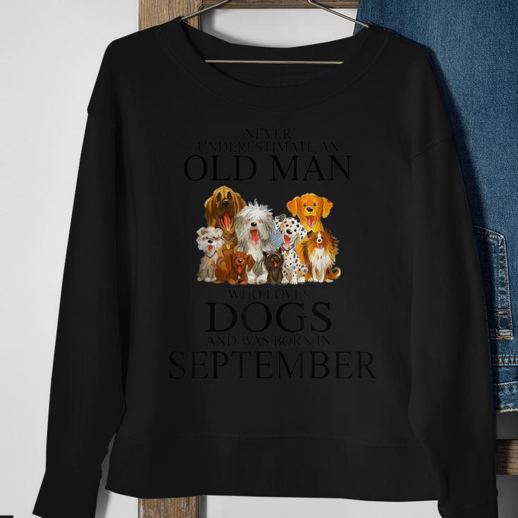 Never Underestimate An Old Man Who Loves Dogs In September Sweatshirt Gifts for Old Women