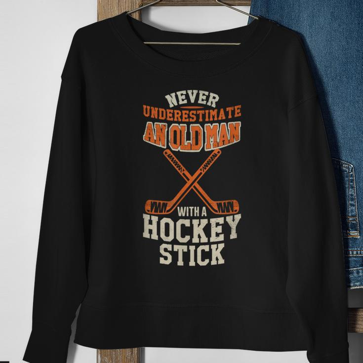 Never Underestimate An Old Man With A Stick Old Man Hockey Sweatshirt Gifts for Old Women