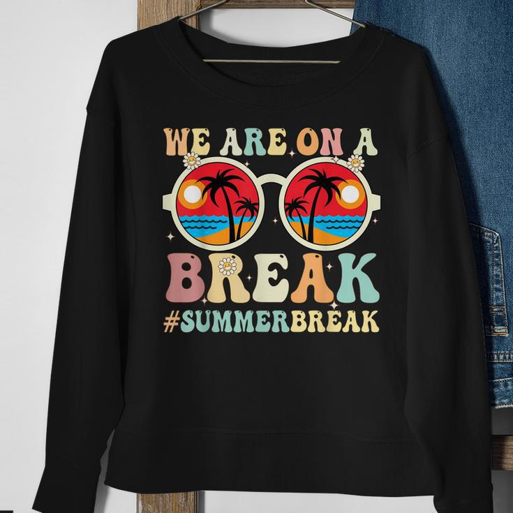 We Are On A Break Teacher Retro Groovy Summer Break Teachers Sweatshirt Gifts for Old Women
